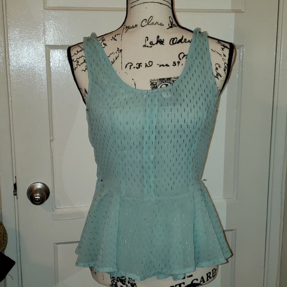 Light green blouse with golden specks